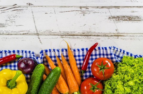 Frame of fresh vegetables on wooden table — Stock Photo, Image