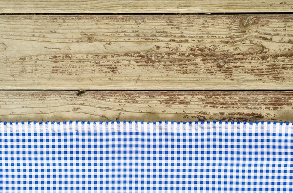 在木桌的蓝色桌布 — 图库照片