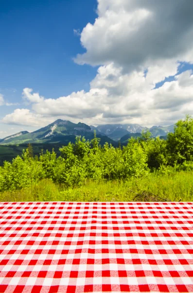 Empty table with landscape background — Stock Photo, Image