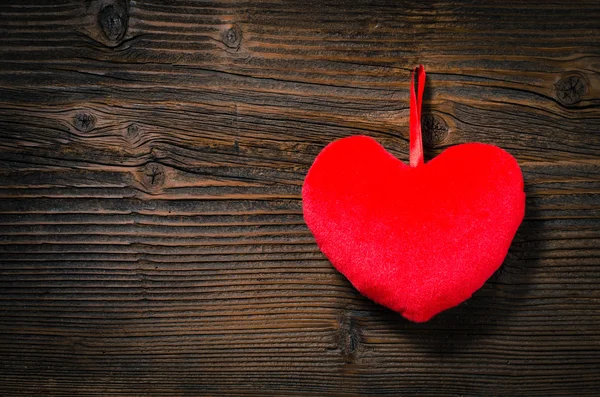 Plush heart on wooden background — Stock Photo, Image