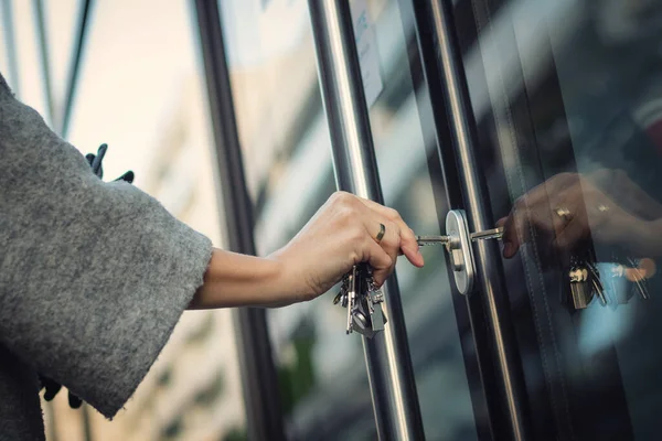 Close Woman Unlocking Entrance Door Key Person Using Key Locking — Stock Photo, Image