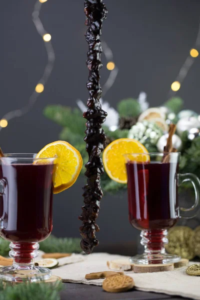 Mugs Warm Wine Orange Cookies Cinnamon Dried Fruit Spruce Branches — Stock Photo, Image