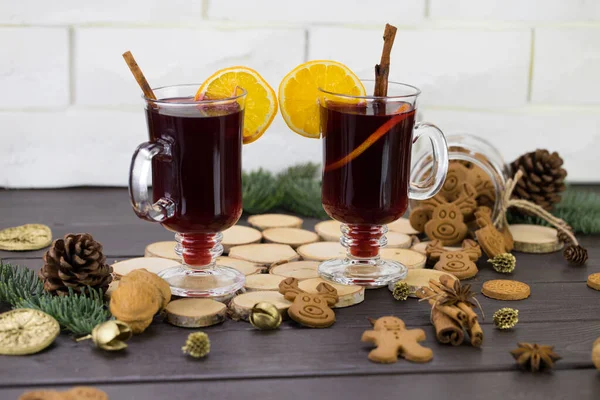 Mugs Warm Wine Orange Cookies Cinnamon Dried Fruit Spruce Branches — Stock Photo, Image