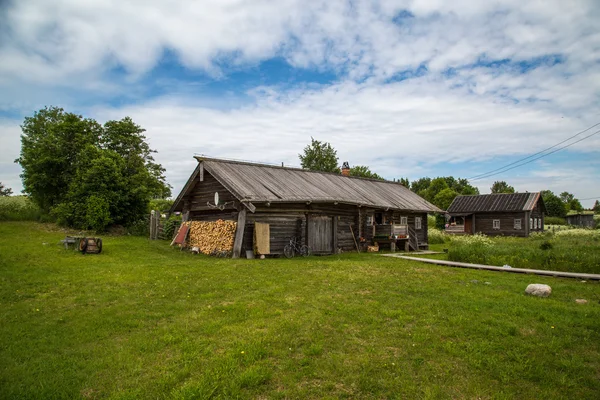 Wooden architecture Nordic countries. Russian wooden houses, churches, barns, sheds. — Stock Image Wooden architecture Nordic countries. Russian wooden houses, churches, barns, sheds. Stock Photo