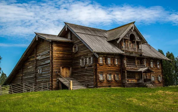 Wooden architecture Nordic countries. Russian wooden houses, churches, barns, sheds. — Stock Image Wooden architecture Nordic countries. Russian wooden houses, churches, barns, sheds. Stock Photo