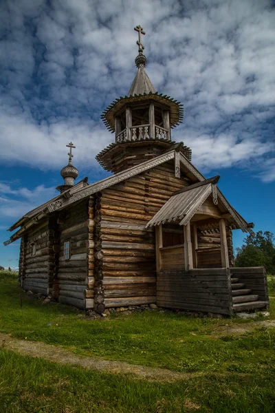 Wooden architecture Nordic countries. Russian wooden houses, churches, barns, sheds. — Stock Image Wooden architecture Nordic countries. Russian wooden houses, churches, barns, sheds. Royalty Free Stock Images