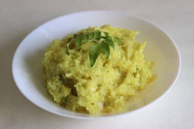 Kerala 'nın en sevdiği yemek olan ezilmiş tapyoka.