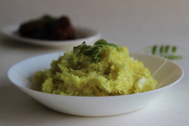 Kerala 'nın en sevdiği yemek olan ezilmiş tapyoka.