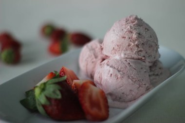 Eggless Strawberry ice cream with fresh strawberries, heavy cream and condensed milk for valentines day