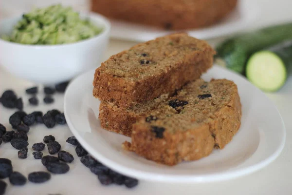 Zucchini raisin bread. Its a soft and moist quick bread made of shredded Zucchini with raisins, cinnamon and a dash of nutmeg added for flavour