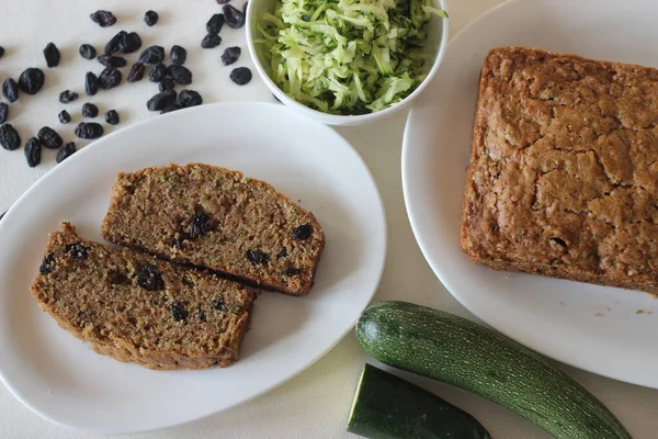 Zucchini raisin bread. Its a soft and moist quick bread made of shredded Zucchini with raisins, cinnamon and a dash of nutmeg added for flavour