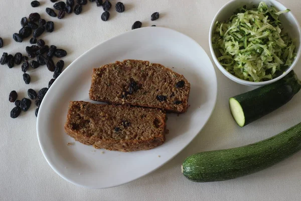 Zucchini raisin bread. Its a soft and moist quick bread made of shredded Zucchini with raisins, cinnamon and a dash of nutmeg added for flavour