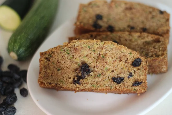 Zucchini raisin bread. Its a soft and moist quick bread made of shredded Zucchini with raisins, cinnamon and a dash of nutmeg added for flavour