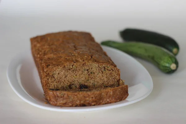 Zucchini raisin bread. Its a soft and moist quick bread made of shredded Zucchini with raisins, cinnamon and a dash of nutmeg added for flavour