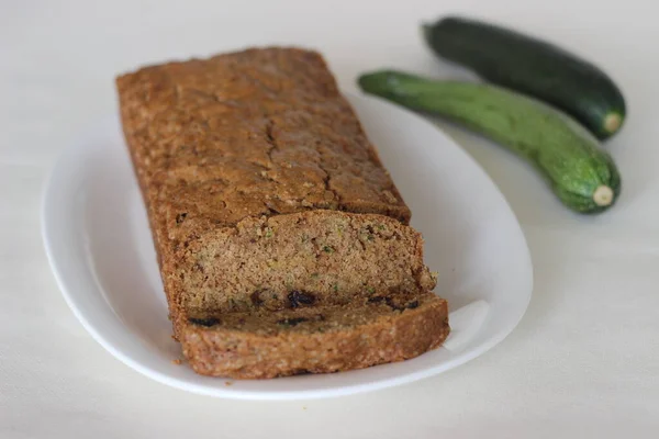 Zucchini raisin bread. Its a soft and moist quick bread made of shredded Zucchini with raisins, cinnamon and a dash of nutmeg added for flavour