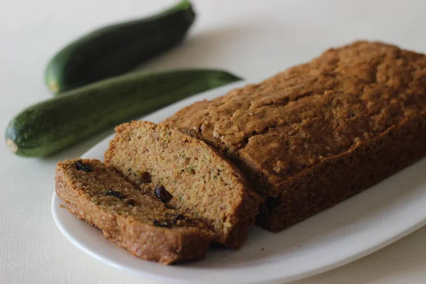 Zucchini raisin bread. Its a soft and moist quick bread made of shredded Zucchini with raisins, cinnamon and a dash of nutmeg added for flavour