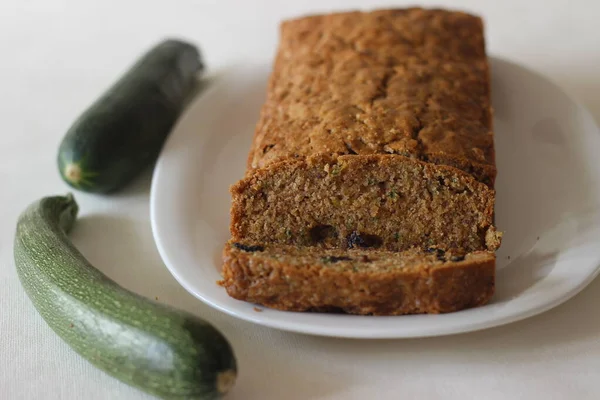 Zucchini raisin bread. Its a soft and moist quick bread made of shredded Zucchini with raisins, cinnamon and a dash of nutmeg added for flavour