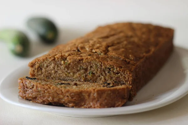 Zucchini raisin bread. Its a soft and moist quick bread made of shredded Zucchini with raisins, cinnamon and a dash of nutmeg added for flavour
