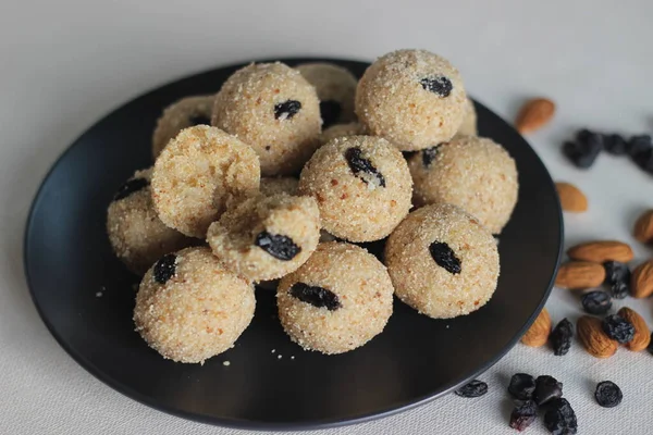 Rava laddu is a South Indian Sweet made with semolina, sugar, ghee, cashews and raisins. Rava is the Indian term for semolina and laddu are sweet balls. Also known as suji ladoo in other parts of India, these are usually made during festivals and are