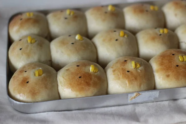 Home baked Easter bread chicks. Buns baked in the shape of chicks as part of Easter celebration. Shot on white background