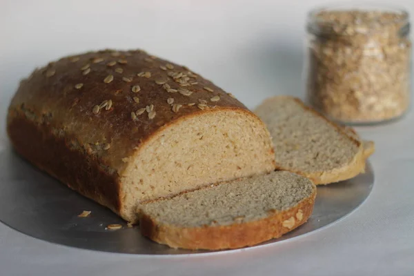 Slices Bread Baked Whole Wheat Oats Shot White Background — Stock Photo, Image