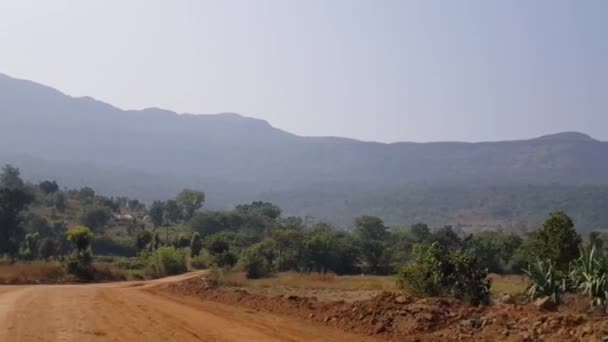 Paisaje Largo Carretera Javan Tungi Carretera Está Construcción Los Campos — Vídeos de Stock