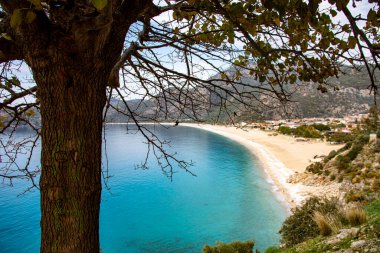 Türkiye 'nin Fethiye ilçesi Oludeniz' in inanılmaz manzarası. Sıcak iklimi ve temiz havası nedeniyle, turistler için önemli bir ziyaret noktası oldu.. 