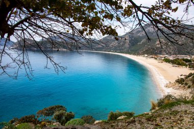 Türkiye 'nin Fethiye ilçesi Oludeniz' in inanılmaz manzarası. Sıcak iklimi ve temiz havası nedeniyle, turistler için önemli bir ziyaret noktası oldu.. 