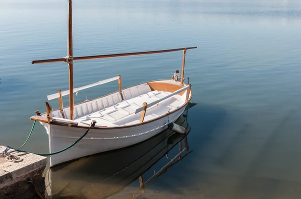 Llaut boat typical of Majorca moored at the dock — Stok fotoğraf