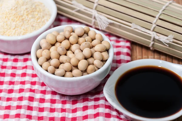 Soy ingredients and a bamboo placemat — Stock Photo, Image