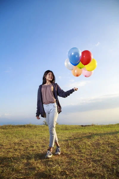 Flying with balloons — Stock Photo, Image