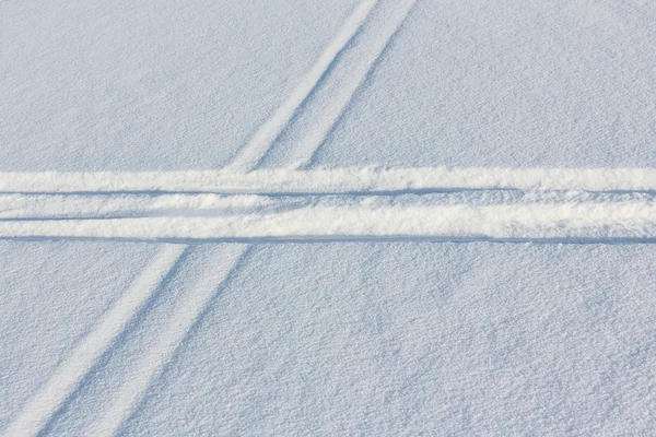 Two ski tracks which are crossed on snow in winter day — Stock Photo, Image