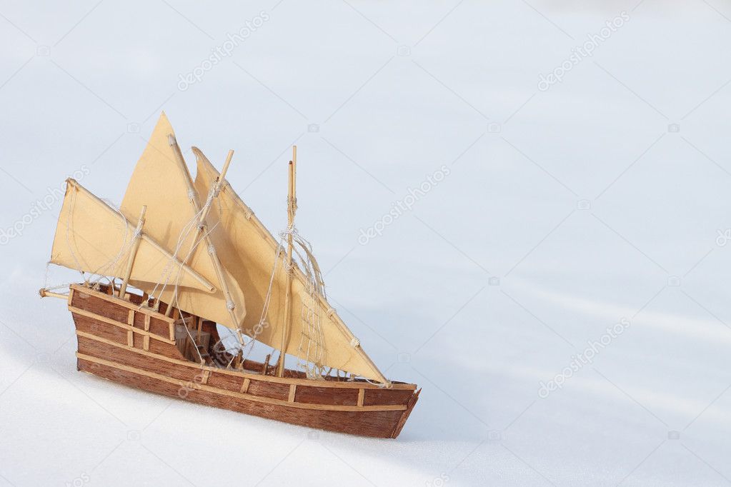 The toy ship on snow