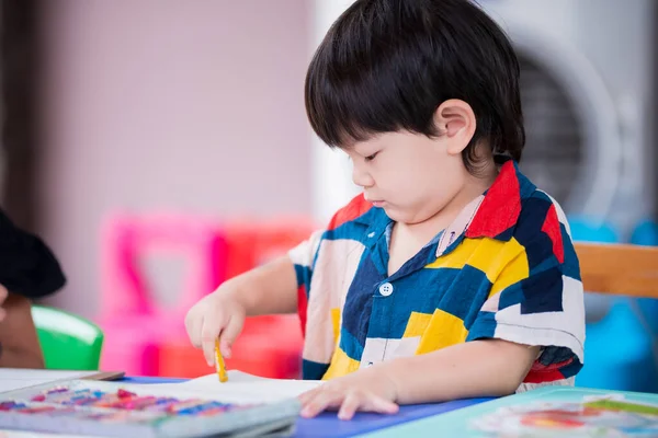 Adorable Asian Boy Painting Chalk Color His Right Hand Children — Zdjęcie stockowe