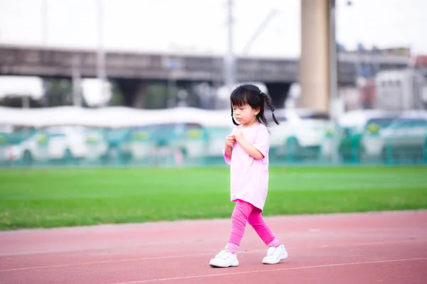 Cute Asian Girl Showing Insecure Embarrassed Expression Children Walking Playground — Stock Photo, Image