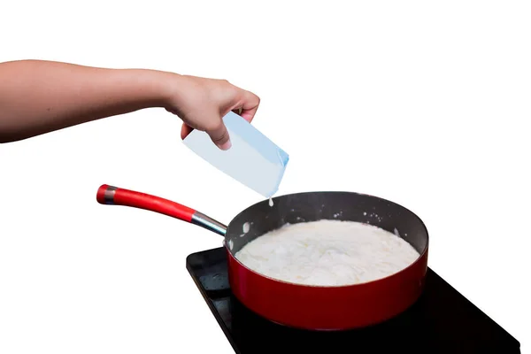 Person Hands Pouring Milk Carton Spaghetti Sauce Pan Set Induction — Stock Photo, Image