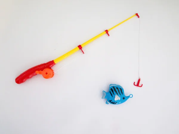 Plastikspielzeug Angeln auf weißem Hintergrund — Stockfoto