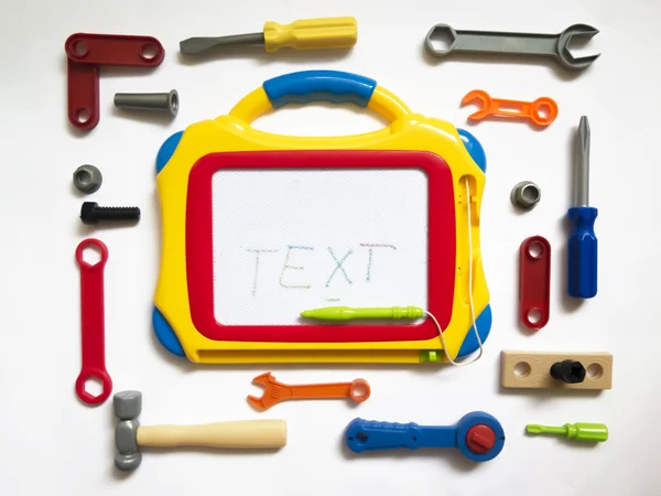 Dla dzieci zabawki instrumenty wokół pokładzie dla tekstu — Zdjęcie stockowe