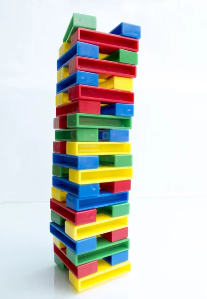 Torre de brinquedo no fundo branco — Fotografia de Stock