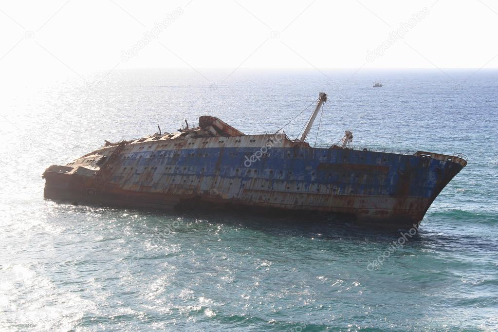 The sunken shipwreck on the reef