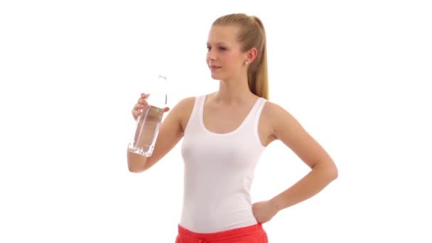 Young woman drinks water. — Stock Video