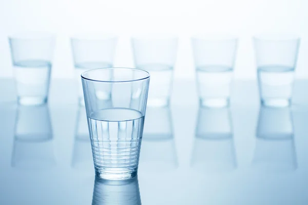 Disposable plastic cups with water