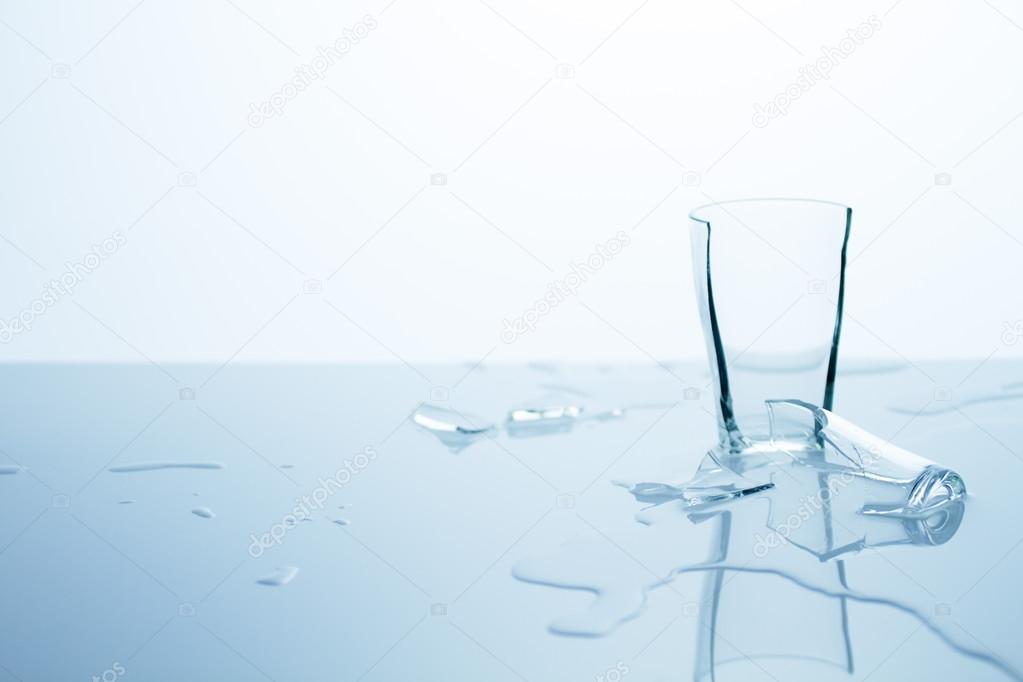 Broken glass with water