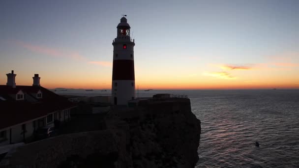Deniz feneri - gün batımı — Stok video