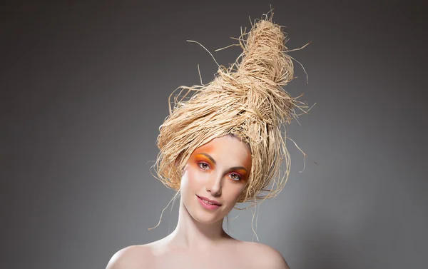 Girl with Hay on her head Stock Photo