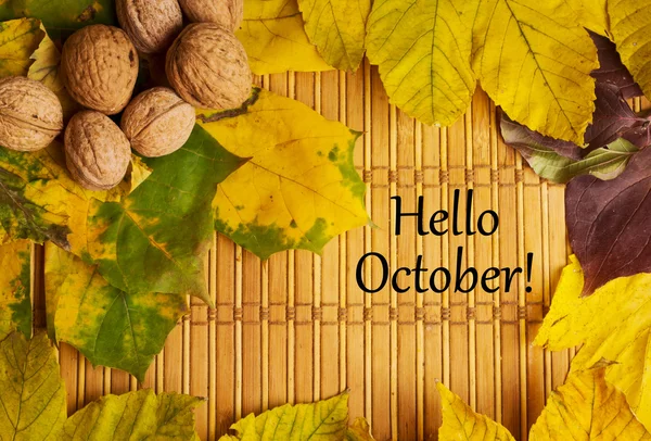 Words hello october on rustic background — Stock Photo, Image