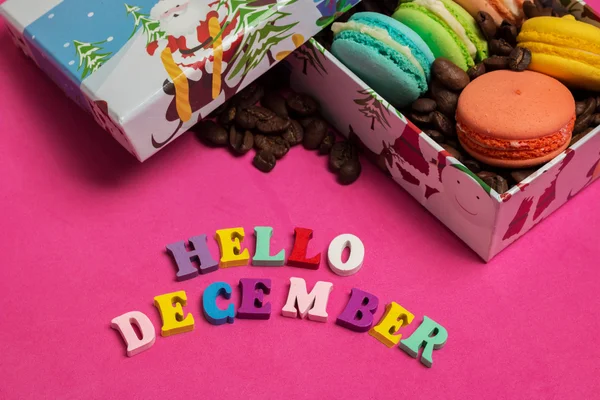 Tag hello december, colorful macaroons in the gift box