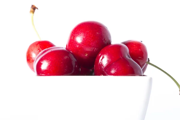 Cherry Berries In A Cup On A White Background — Stock Photo, Image