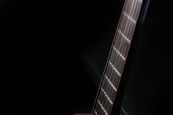 Acoustic Guitar Fingerboard Strings On Black Background