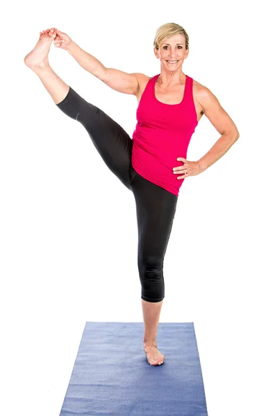 Middle age woman doing yoga exercises — Stock Photo, Image